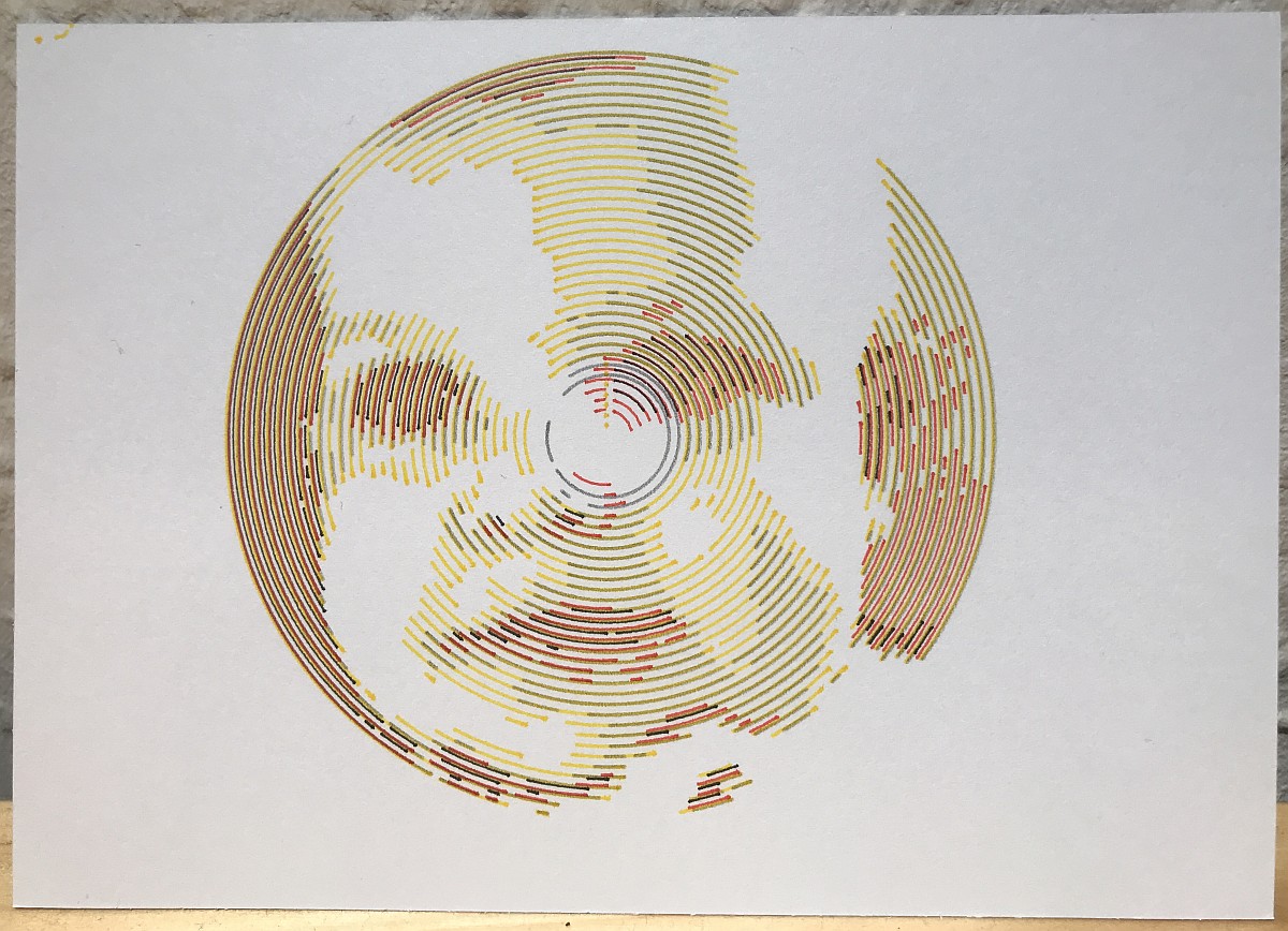 Concentric circles in blue, red, grey and yellow, omitting some parts of the arc to give the reproduction of a baby's face.