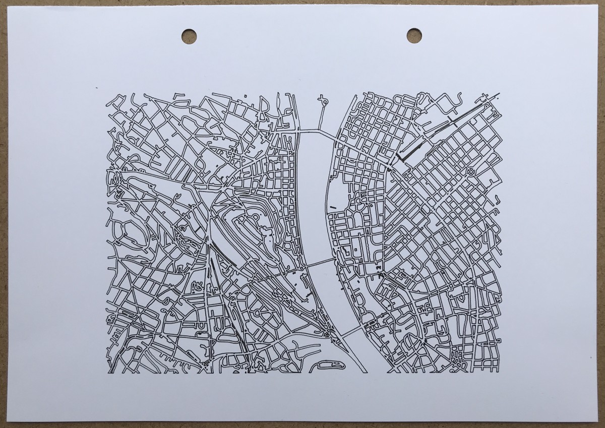 A map of the center of Budapest, showing only the outlines of streets in black ink.