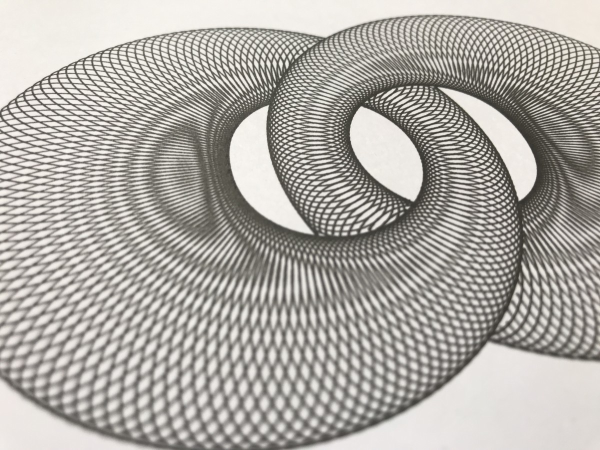 Plotter drawing of a multitude of ellipses. Together they form two assymetric, interlocking ring-like objects with a moiré effect on their surface.